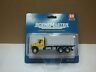 949-11653 Walthers Ho Scale Scenemaster International Axle Flatbed Yellow