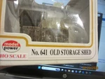 Model Power Ho Scale No. 641 Old Storage Shed With 2 Painted Figures. Fixed Price $9.97.