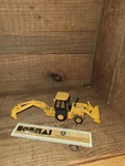 Ertl John Deere 310 Sg Backhoe Toy. Fixed Price $16.99.