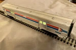 Ho Walthers Proto #920-13049; 73 Budd Baggage Car Amtrak Phase I; Led Lights. Fixed Price $90.00.