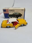Tomica # F4 Ford Continental Mark Iv Yellow New Vintage Blue Box 1:77 Scale 1976. Fixed Price $79.76.