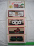 Model Power 9701, 4 Christmas Cars, Freight Flat Santa Holiday, Limited,ho Scale. Fixed Price $59.99.