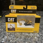 Norscot # 55107 Cat 315C Hydraulic Excavator - 1/87TH Scale Diecast Model. Fixed Price $18.19.