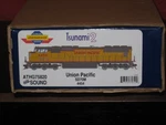 Athearn Genesis Ho Scale Tsunami 2 Union Pacific SD70M 4454. Fixed Price $234.95.