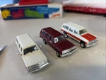 3 Ho 1/87 Scale, Used Trident Chevrolet Suburbans -1 Maroon 2 White Loose. Fixed Price $35.99.