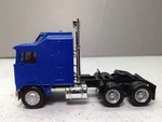 Ho 1:87 Promotex # 25258 Kw K-100 Bar Grill Tandem Tractor Blue. Fixed Price $19.95.