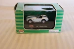 Ho Scale Model Power, 1965 Shelby Cobra Convertible, White, #19225. Fixed Price $24.00.