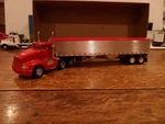 Model Power/promotex Ho Scale Custom Kenworth T-600 With Driver & Grain Trailer. Fixed Price $40.00.