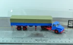 Brekina Old Timer Henschel Tractor W/ Covered Flat Trailer 1:87 (HO5213). Fixed Price $17.99.