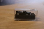 Ho Scale Praline, 1956 Ford Thunderbird Convertible, Gray Top, Black, #5203. Fixed Price $24.00.