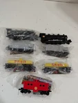Atlas Train Ho Gauge Model Railroad Shell Promo Steam Engine & Freight Cars. Fixed Price $17.00.