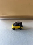 Ho 1/87 Scale, Busch Smart Car - Yellow Blk Top Loose. Fixed Price $15.00.