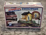 Life Like Ho Scale Operating Switchman With Lighted Building Item No. 8203. Fixed Price $12.95.
