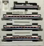 Bachmann Spectrum Amtrak Ho Scale Analog Dc Set LOCOMOTIVE/3 Cars EMDF40PH. Fixed Price $300.00.