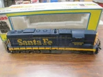 Atlas 7001 Ho Scale SD24 Santa Fe Diesel Locomotive 979. Fixed Price $50.00.