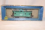 Ho Scale Ahm, Extended Vision Caboose, Penn Central, Green #4751 - 5485. Fixed Price $20.00.