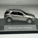 Mini 1/87 Scale Silver Mercedes-benz M- Class Model Car With Display Case. Fixed Price $40.00.