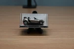 Busch 1/87 Scale #49302 - Silver Smart Roadster Traveller. Fixed Price $19.99.