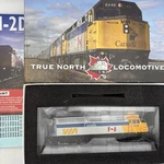 Rapido Ho 80016 F40PH-2D-DC Via Rail Canada Scheme #6418. Fixed Price $325.00.