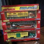Die Cast Metal Super Movers Trucks: Semi-circus, Fire Engine, And Kenworth Catle. Fixed Price $54.99.
