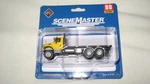 Walthers Ho International 7600 3-AXLE Flatbed With Yellow Cab #949-11653. Fixed Price $14.29.