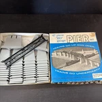 Atlas, Ho Gauge 47-PIECE Pier Set, Number 80, With The Original Box Complete. Fixed Price $7.99.
